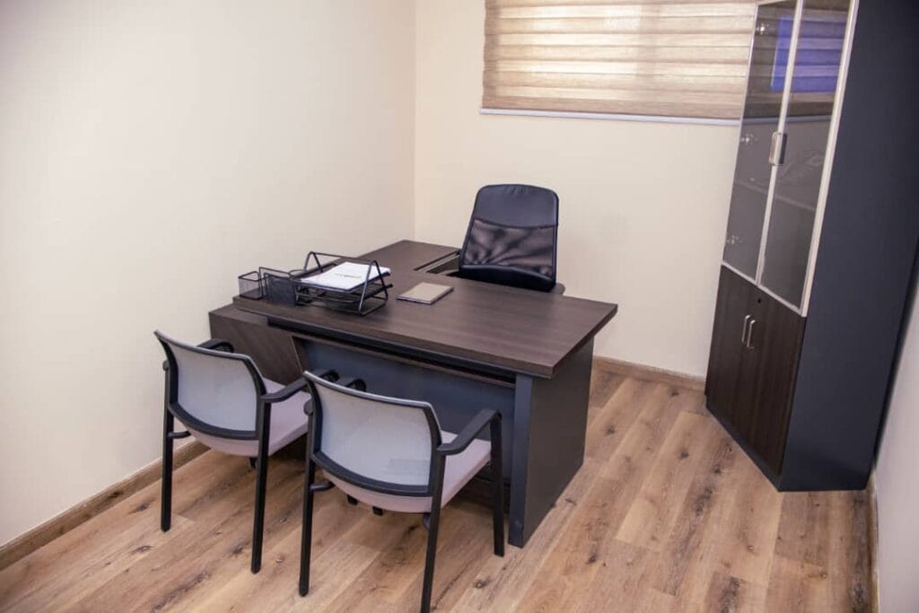Fully furnished private office space at Smith Desk with desks, chairs, and high-speed internet.