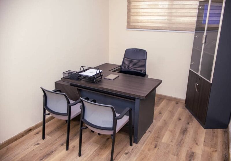 Fully furnished private office space at Smith Desk with desks, chairs, and high-speed internet.